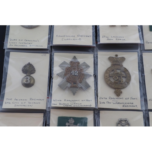 378 - A COLLECTION OF BRITISH MILITARY CAP BADGES. A mixed collection of cap and similar badges to include... 