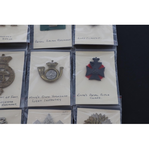 378 - A COLLECTION OF BRITISH MILITARY CAP BADGES. A mixed collection of cap and similar badges to include... 