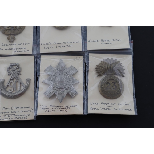 378 - A COLLECTION OF BRITISH MILITARY CAP BADGES. A mixed collection of cap and similar badges to include... 