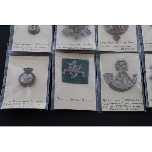 378 - A COLLECTION OF BRITISH MILITARY CAP BADGES. A mixed collection of cap and similar badges to include... 