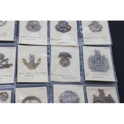 379 - A COLLECTION OF BRITISH MILITARY BADGES AS WORN ON SLOUCH HATS AND FORAGE CAPS BY INFANTRY REGIMENTS... 