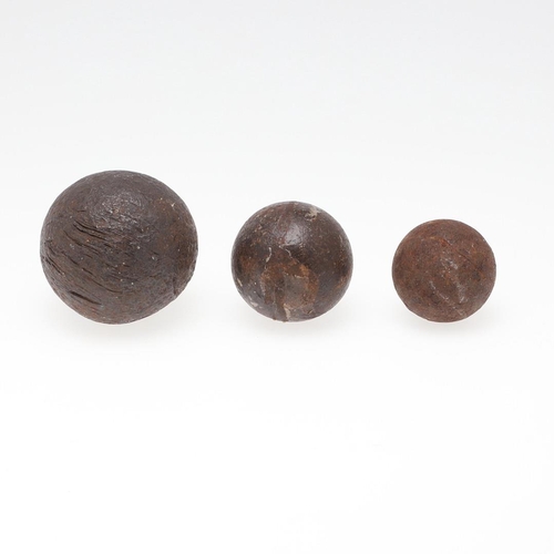 38 - THREE CANNONBALLS. Three cannonballs, 8cm, 6cm and 4cm. Probably 19th century. 3.  *CR  See image, a... 