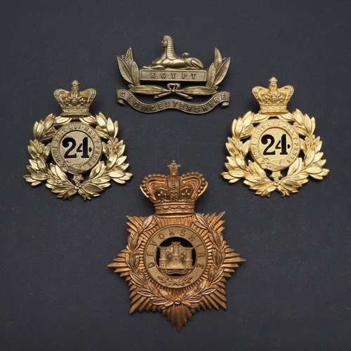 386 - TWO SOUTH WALES BORDERERS SHAKO BADGES AND OTHERS SIMILAR. Two 24th Regiment of Foot (South Wales Bo... 