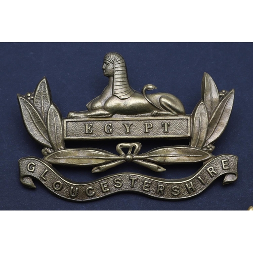 386 - TWO SOUTH WALES BORDERERS SHAKO BADGES AND OTHERS SIMILAR. Two 24th Regiment of Foot (South Wales Bo... 