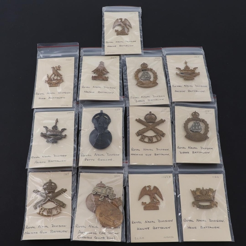 388 - A COLLECTION OF CAP BADGES FOR THE ROYAL NAVAL DIVISIONS. A collection of Royal Naval Division cap b... 