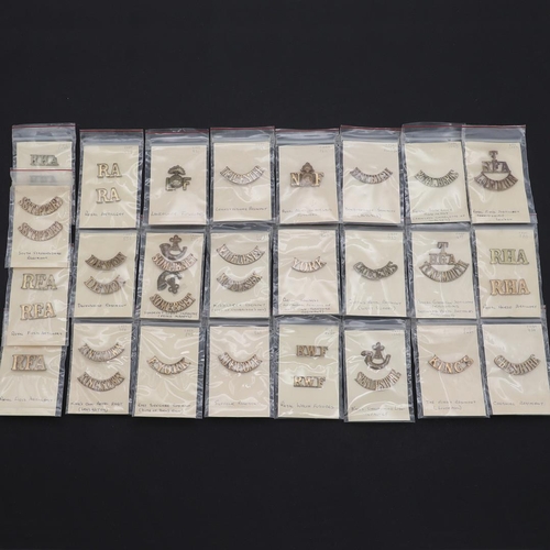 393 - A COLLECTION OF BRITISH MILITARY BRASS SHOULDER TITLES. An extensive collection of Shoulder Titles t... 