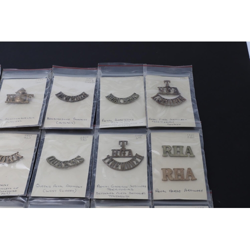 393 - A COLLECTION OF BRITISH MILITARY BRASS SHOULDER TITLES. An extensive collection of Shoulder Titles t... 