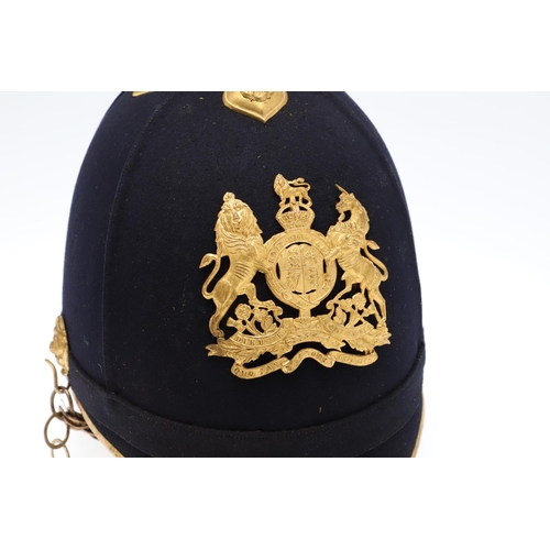 402 - A ROYAL ENGINEERS HOME SERVICE BLUE CLOTH HELMET. An early 20th century Royal Engineers Volunteer Of... 