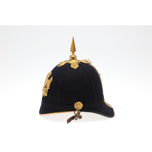 402 - A ROYAL ENGINEERS HOME SERVICE BLUE CLOTH HELMET. An early 20th century Royal Engineers Volunteer Of... 