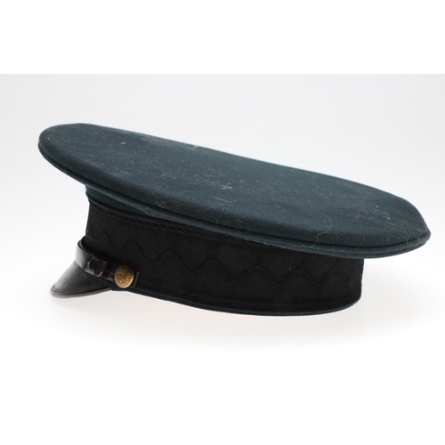 403 - A 1908 PATTERN PEAKED CAP WITH OXFORD AND BUCKS LIGHT INFANTRY BADGE. A black 1908 pattern peaked ca... 