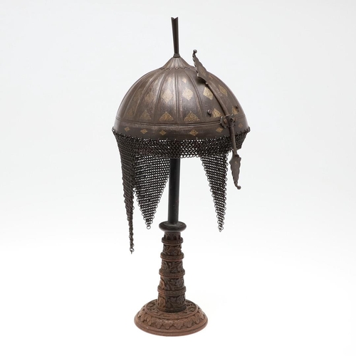 404 - A 19TH CENTURY INDO PERSIAN KULAH KHUD HELMET. With a decorative fluted bowl with central plume fixi... 