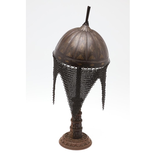 404 - A 19TH CENTURY INDO PERSIAN KULAH KHUD HELMET. With a decorative fluted bowl with central plume fixi... 