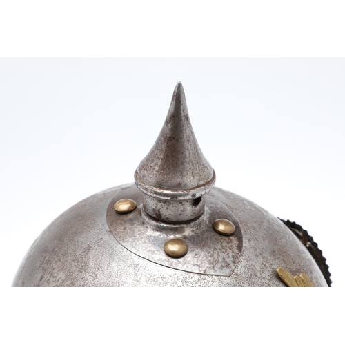 405 - A PRUSSIAN MAN's  KURASSIER TYPE HELMET OF THE 2ND KURASSIER REGIMENT. A Steel helmet with round spi... 