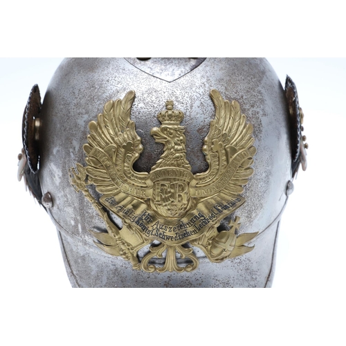 405 - A PRUSSIAN MAN's  KURASSIER TYPE HELMET OF THE 2ND KURASSIER REGIMENT. A Steel helmet with round spi... 