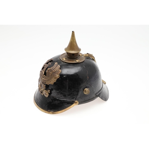 407 - A FIRST WORLD WAR PRUSSIAN INFANTRY TYPE PICKELHAUBE. a black leather pickelhaube type helmet, the h... 