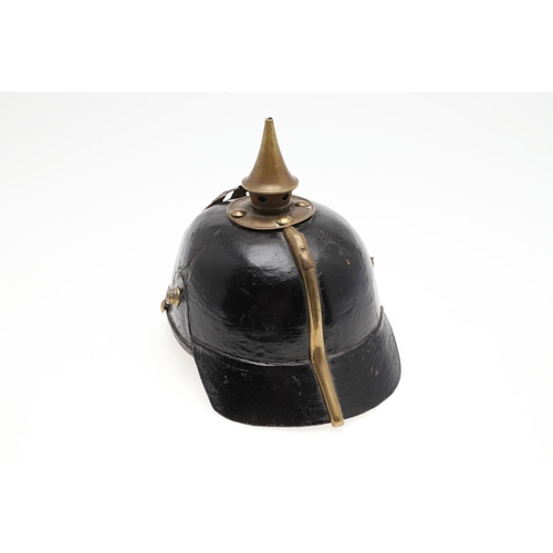 407 - A FIRST WORLD WAR PRUSSIAN INFANTRY TYPE PICKELHAUBE. a black leather pickelhaube type helmet, the h... 