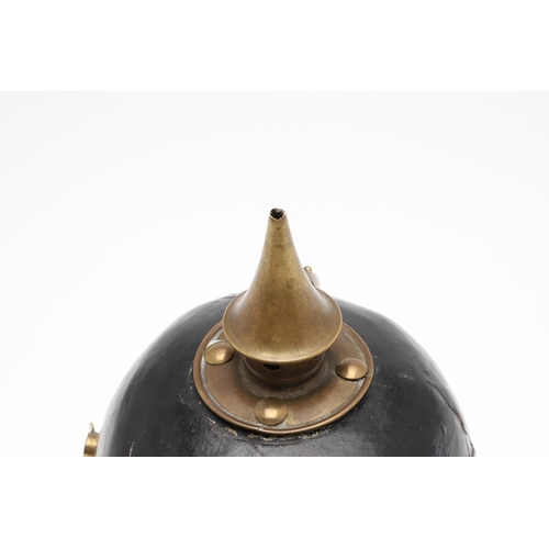 407 - A FIRST WORLD WAR PRUSSIAN INFANTRY TYPE PICKELHAUBE. a black leather pickelhaube type helmet, the h... 