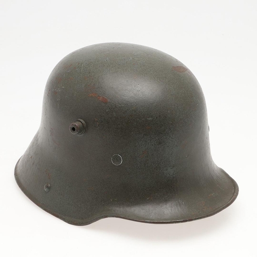 408 - A FIRST WORLD WAR M.17 STEEL HELMET. A Great War Trench Helmet with fieldgrey finish, stamped ET64 i... 