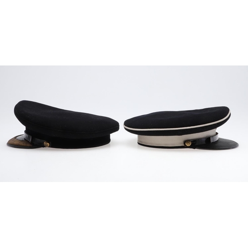 419 - TWO DRAGOON GUARDS OFFICER's  PEAKED DRESS CAPS. A peaked dress cap for the Queen's  Bays (2nd Batta... 