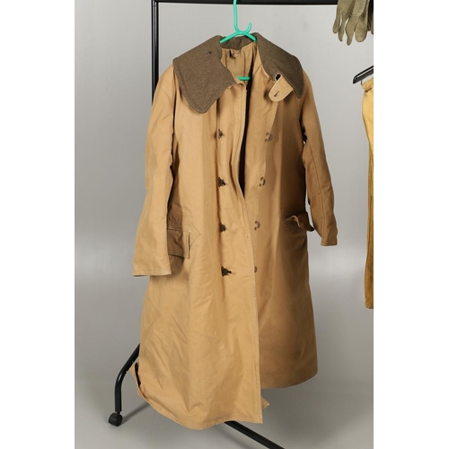 427 - A SECOND WORLD WAR PILOTS OVERCOAT, TROUSERS AND FACE MASK. A large overcoat with quilted lining and... 