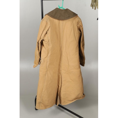 427 - A SECOND WORLD WAR PILOTS OVERCOAT, TROUSERS AND FACE MASK. A large overcoat with quilted lining and... 