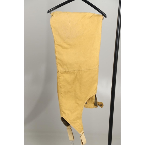 427 - A SECOND WORLD WAR PILOTS OVERCOAT, TROUSERS AND FACE MASK. A large overcoat with quilted lining and... 