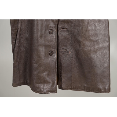 428 - A SECOND WORLD WAR LEATHER JERKIN. A leather jerking with four button front. 76cm top to bottom, app... 