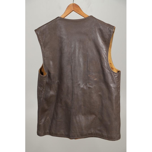 428 - A SECOND WORLD WAR LEATHER JERKIN. A leather jerking with four button front. 76cm top to bottom, app... 