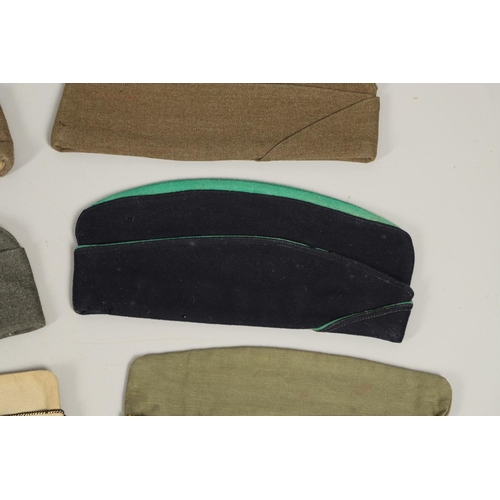 433 - A COLLECTION OF AMERICAN MILITARY SIDE CAPS. A collection of American military caps to include a cap... 