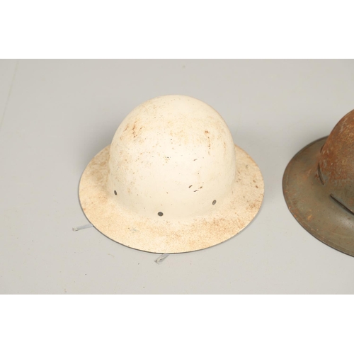 434 - A SECOND WORLD WAR FIRE SERVICE HELMET AND TWO OTHERS. A Second World War fire service helmet with N... 