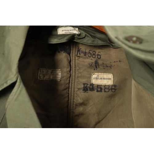 436 - A US ARMY OVERCOAT AND LINER. An American Army overcoat, double breasted with eight buttons, with co... 