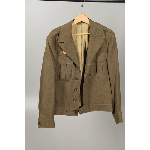 441 - A COLLECTION OF SECOND WORLD WAR AND LATER AMERICAN MILITARY UNIFORM. A 1944 pattern Wool field jack... 