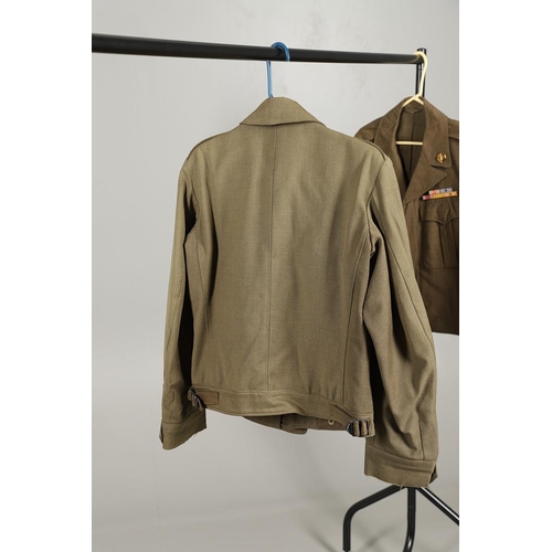 441 - A COLLECTION OF SECOND WORLD WAR AND LATER AMERICAN MILITARY UNIFORM. A 1944 pattern Wool field jack... 