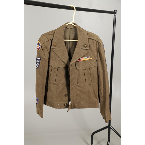 441 - A COLLECTION OF SECOND WORLD WAR AND LATER AMERICAN MILITARY UNIFORM. A 1944 pattern Wool field jack... 