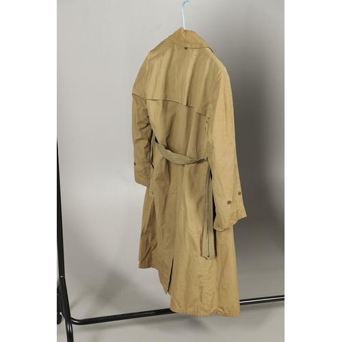 443 - AN AMERICAN VIETNAM PERIOD PONCHO AND FOUR UNIFORM OVERCOATS. A Vietnam era poncho by the Southern A... 