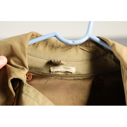 443 - AN AMERICAN VIETNAM PERIOD PONCHO AND FOUR UNIFORM OVERCOATS. A Vietnam era poncho by the Southern A... 