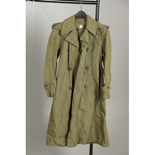 443 - AN AMERICAN VIETNAM PERIOD PONCHO AND FOUR UNIFORM OVERCOATS. A Vietnam era poncho by the Southern A... 