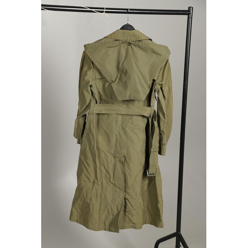 443 - AN AMERICAN VIETNAM PERIOD PONCHO AND FOUR UNIFORM OVERCOATS. A Vietnam era poncho by the Southern A... 