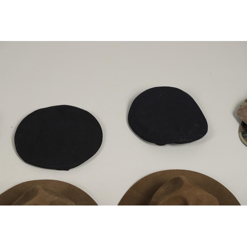 448 - A COLLECTION OF AMERICAN MILITARY HATS TO INCLUDE TWO US NAVY SUN HELMETS. Two US sun helmets, one m... 