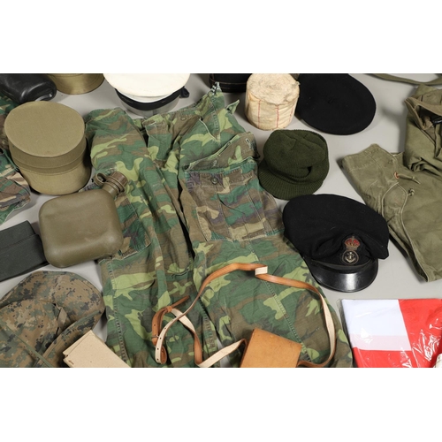 450 - A LARGE COLLECTION OF ASSORTED MILITARY UNIFORM, HEADGEAR AND MISCELLANEOUS ITEMS. A collection of a... 