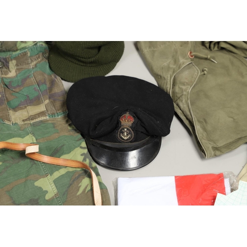 450 - A LARGE COLLECTION OF ASSORTED MILITARY UNIFORM, HEADGEAR AND MISCELLANEOUS ITEMS. A collection of a... 