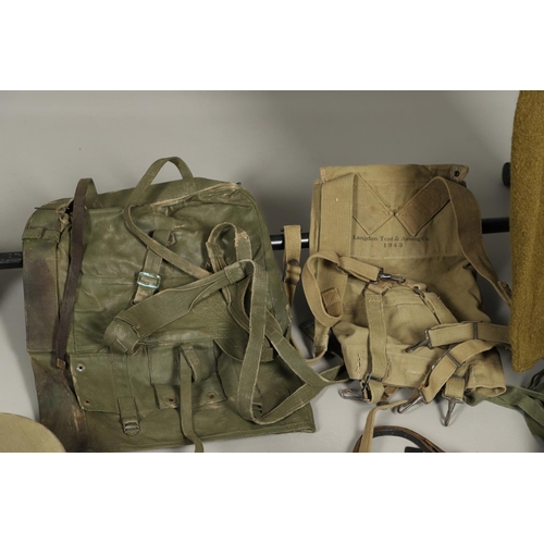 450 - A LARGE COLLECTION OF ASSORTED MILITARY UNIFORM, HEADGEAR AND MISCELLANEOUS ITEMS. A collection of a... 