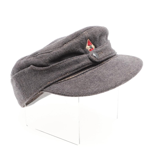 454 - A SECOND WORLD WAR HITLER YOUTH WINTER SERVICE CAP. A light grey Hitler Youth winter 's ki' type cap... 