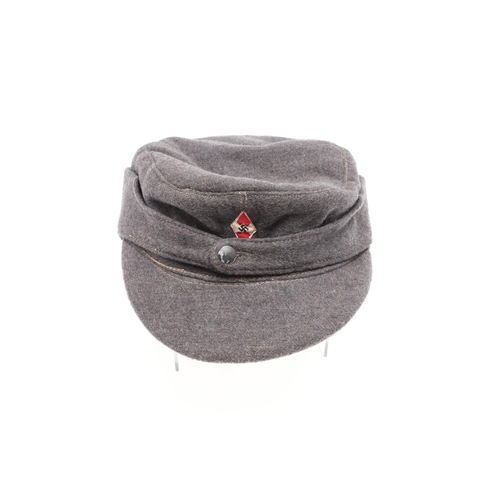 454 - A SECOND WORLD WAR HITLER YOUTH WINTER SERVICE CAP. A light grey Hitler Youth winter 's ki' type cap... 