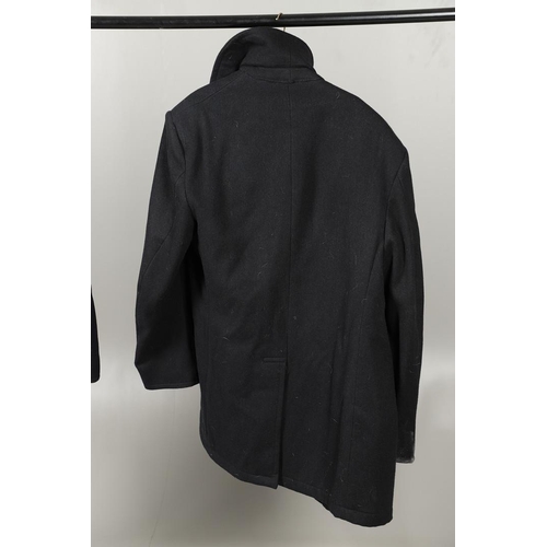 456 - TWO POST SECOND WORLD WAR U.S. NAVY 'PEA' COATS. A dark blue/black navy double breasted 'pea' coat w... 