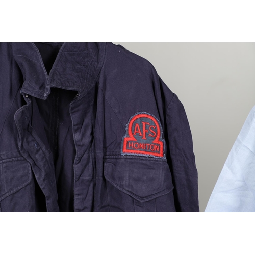 457 - A COLLECTION OF AUXILIARY FIRE SERVICE UNIFORM AND KIT. A collection of uniform and kit to include a... 