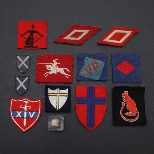 478 - A COLLECTION OF SECOND WORLD WAR SECTOR AND UNIT PATCHES. A collection of British Army cloth patches... 