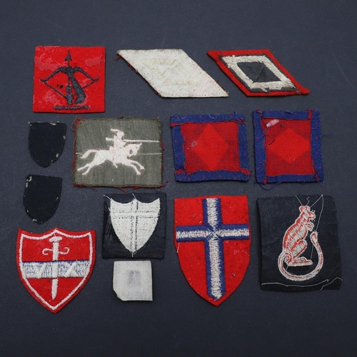 478 - A COLLECTION OF SECOND WORLD WAR SECTOR AND UNIT PATCHES. A collection of British Army cloth patches... 