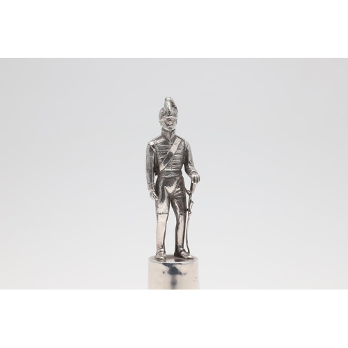 485 - A SMALL SILVER FIGURE OF A SOLDIER IN THE FROME SELWOOD VOLUNTEER CAVALRY BY GARRARDS. A small cast ... 