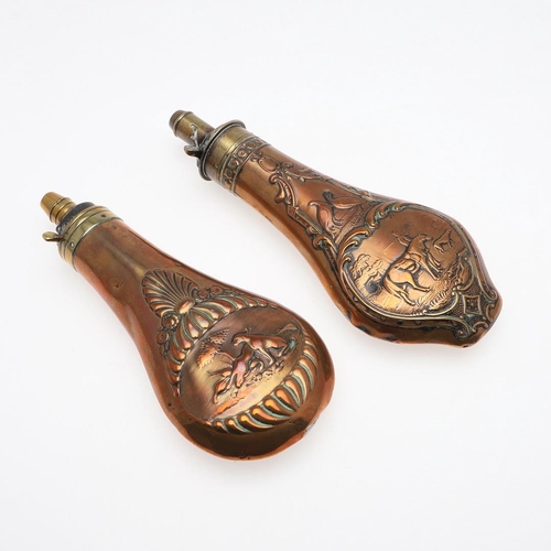 486 - TWO LATE 19TH CENTURY COPPER AND BRASS POWDER FLASKS. A Copper bodied powder flask decorated with a ... 